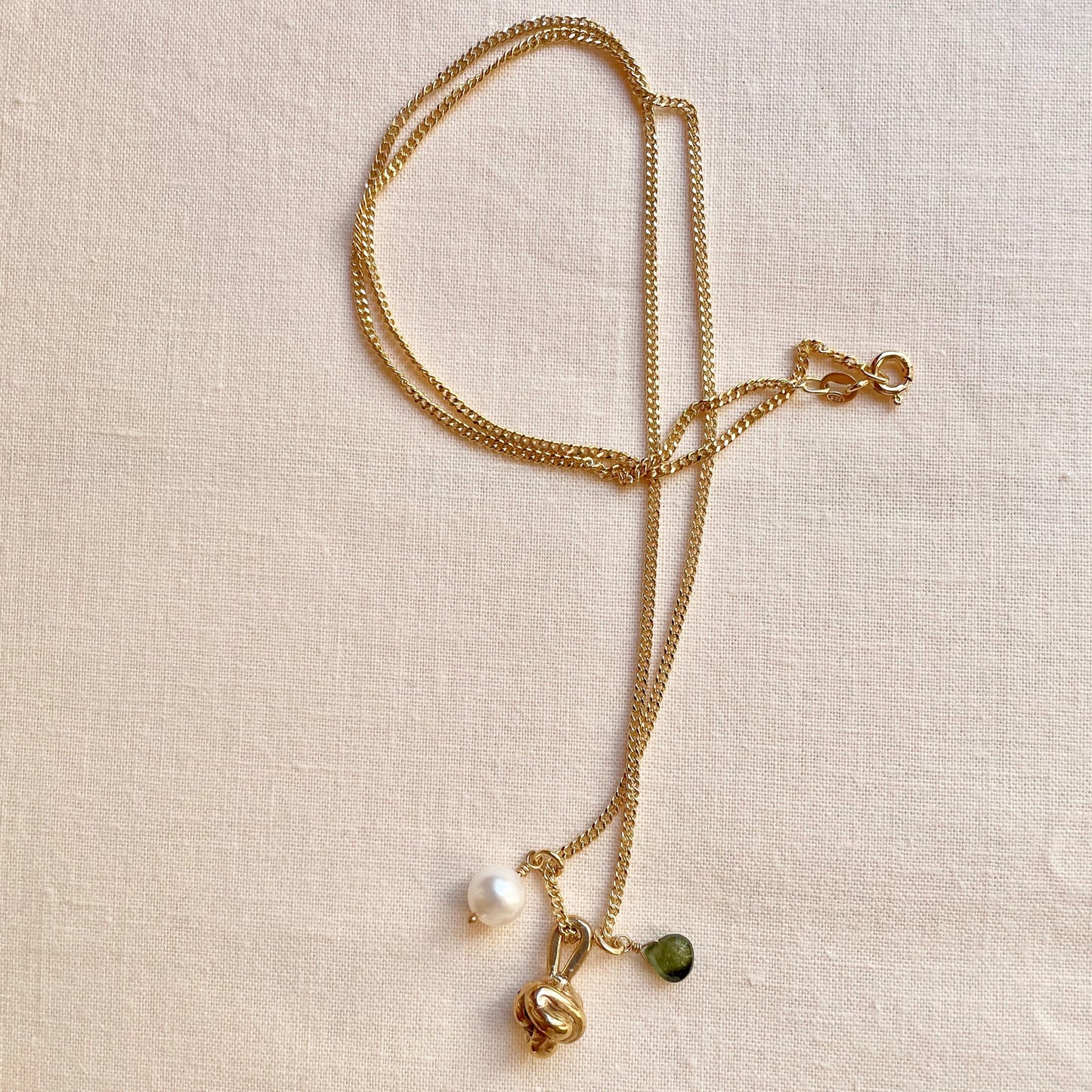 Be Free Necklace. Bronze knot, Pearl and Green Tourmaline Briolette