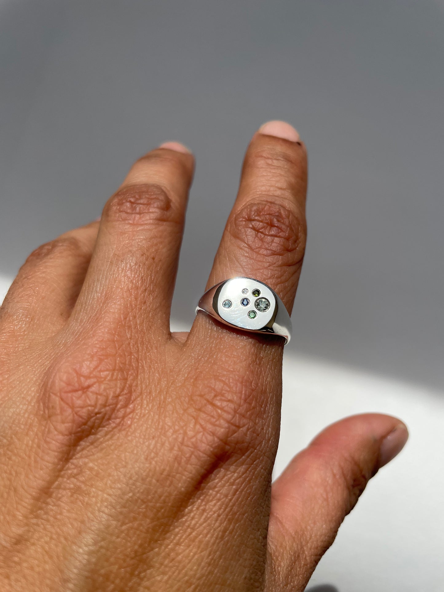 Silver signet with Tsavorite Garnet, Swiss Blue Topaz, Sapphire, Diamond, Green Tourmaline and Light Blue Sapphire