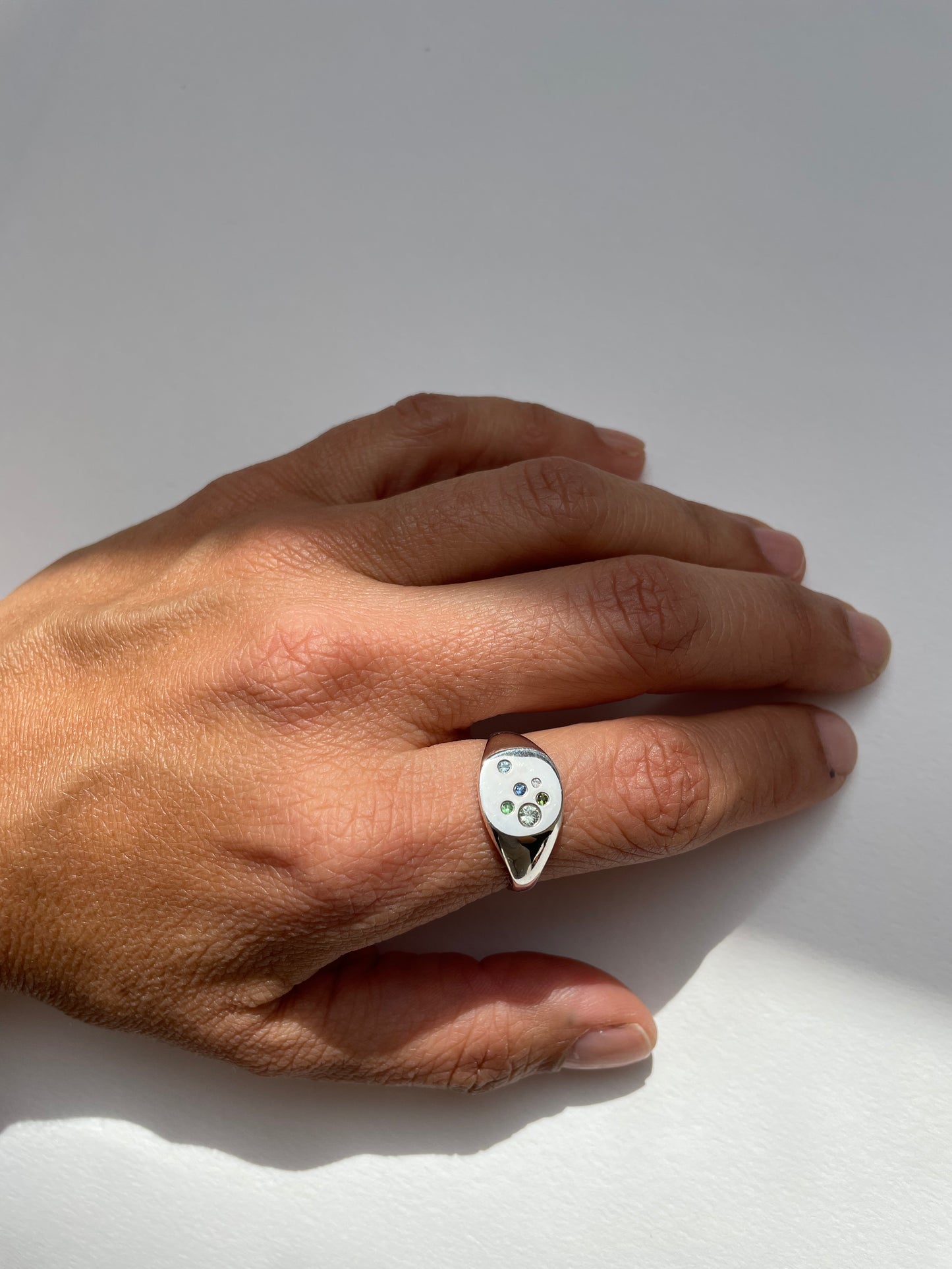 Silver signet with Tsavorite Garnet, Swiss Blue Topaz, Sapphire, Diamond, Green Tourmaline and Light Blue Sapphire