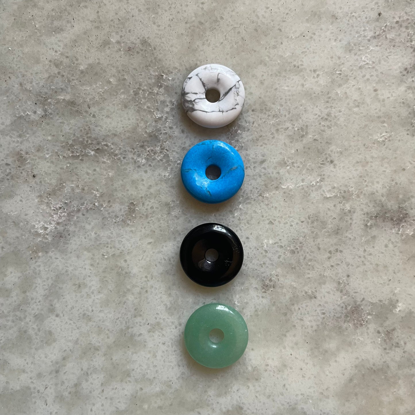 pair of semi precious donuts