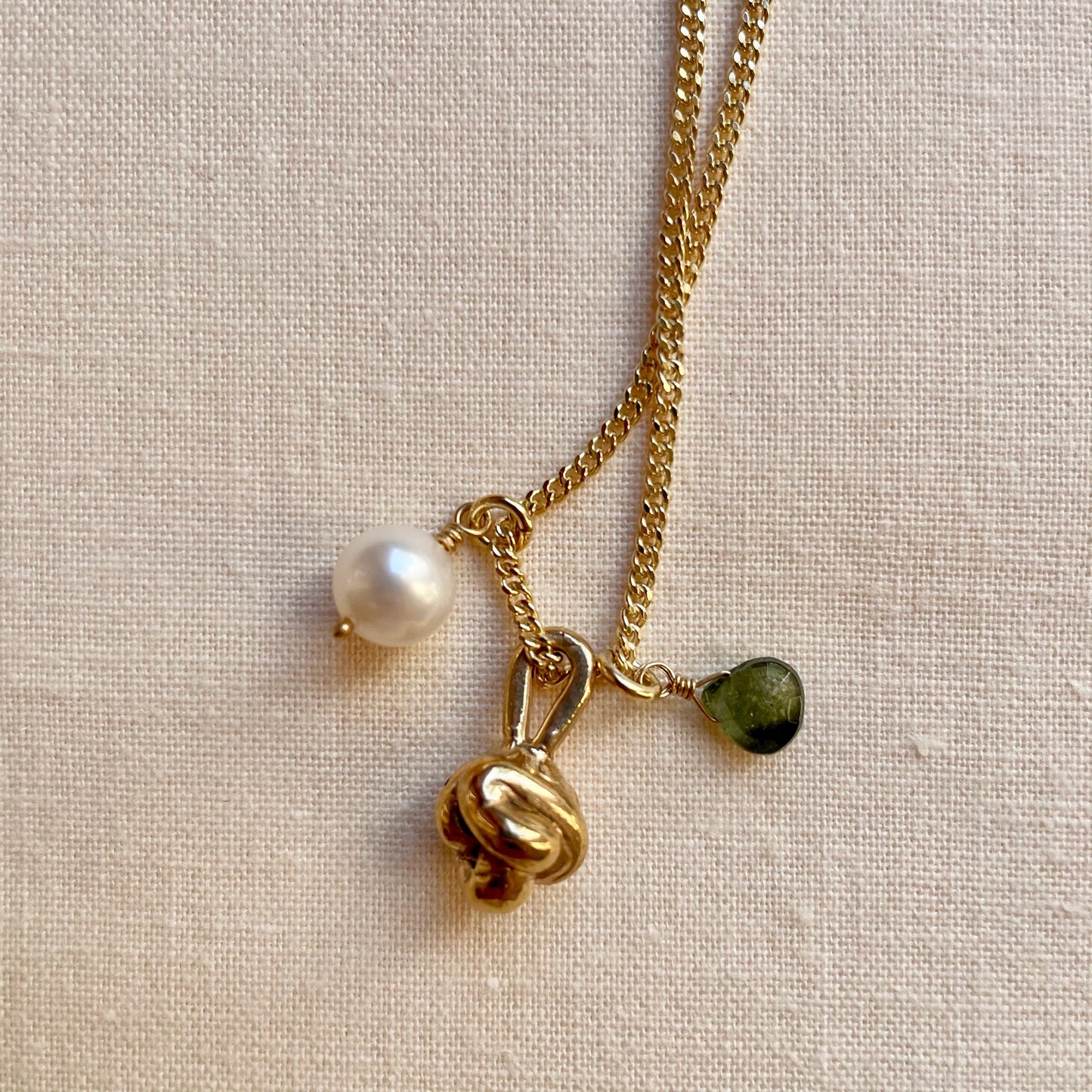 Be Free Necklace. Bronze knot, Pearl and Green Tourmaline Briolette